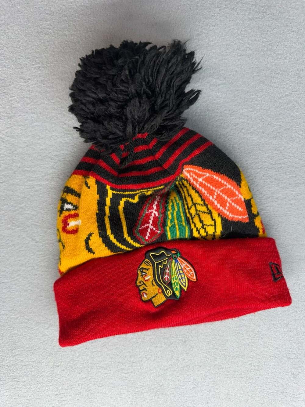 New Era Chicago Blackhawks Pom Knit Hat Black Red Yellow